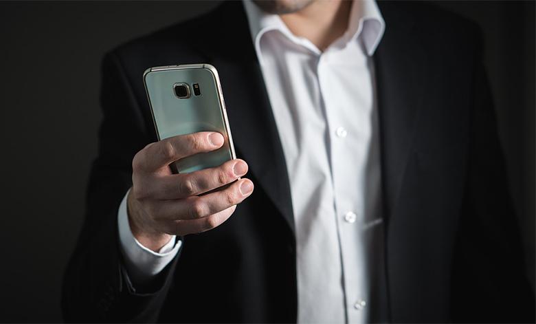 Photo of a smartphone with the Facebook application open