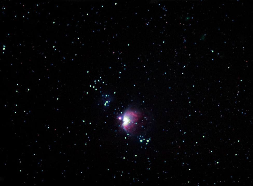 A photo shows a star system, the Orion Nebula.