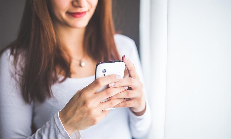 Photo of a smartphone with the Facebook application open