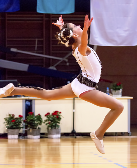 Image of dancer on tablet with high tech background