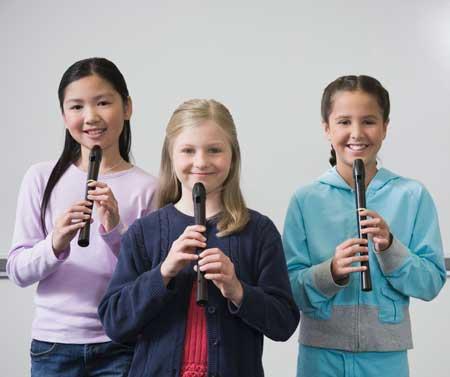 Image of three students with recorders