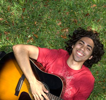 Image of a young man with guitar