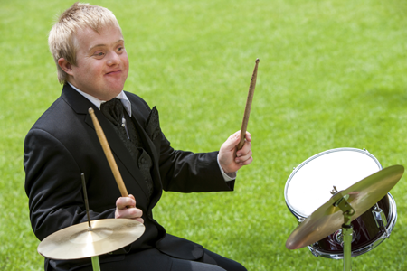 Image of a student playing drums