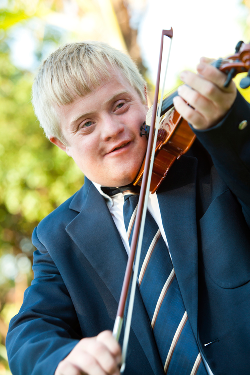 Image of special needs student playing violin