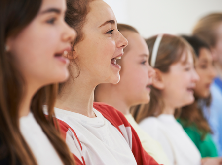 Image of a group of choir students singing