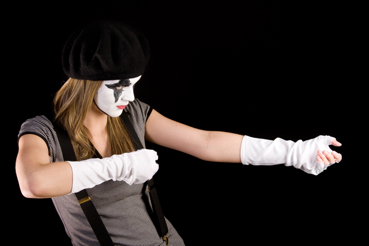 Student mime pulling invisible rope
