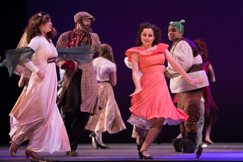 Students performing on stage