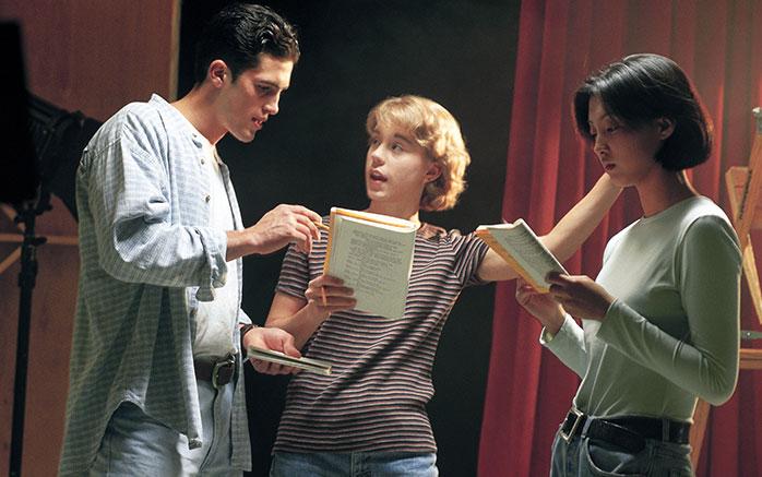 Students on stage in costume