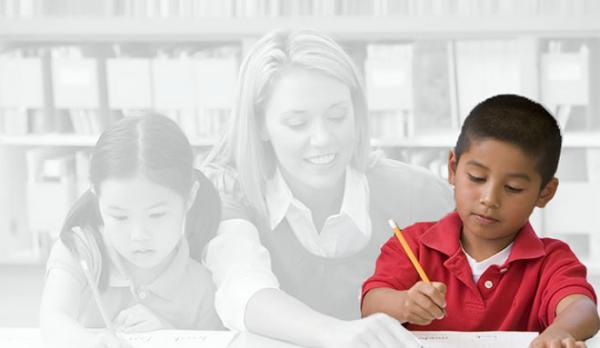 Teacher with two elementary students