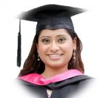 Female student in a cap and gown.